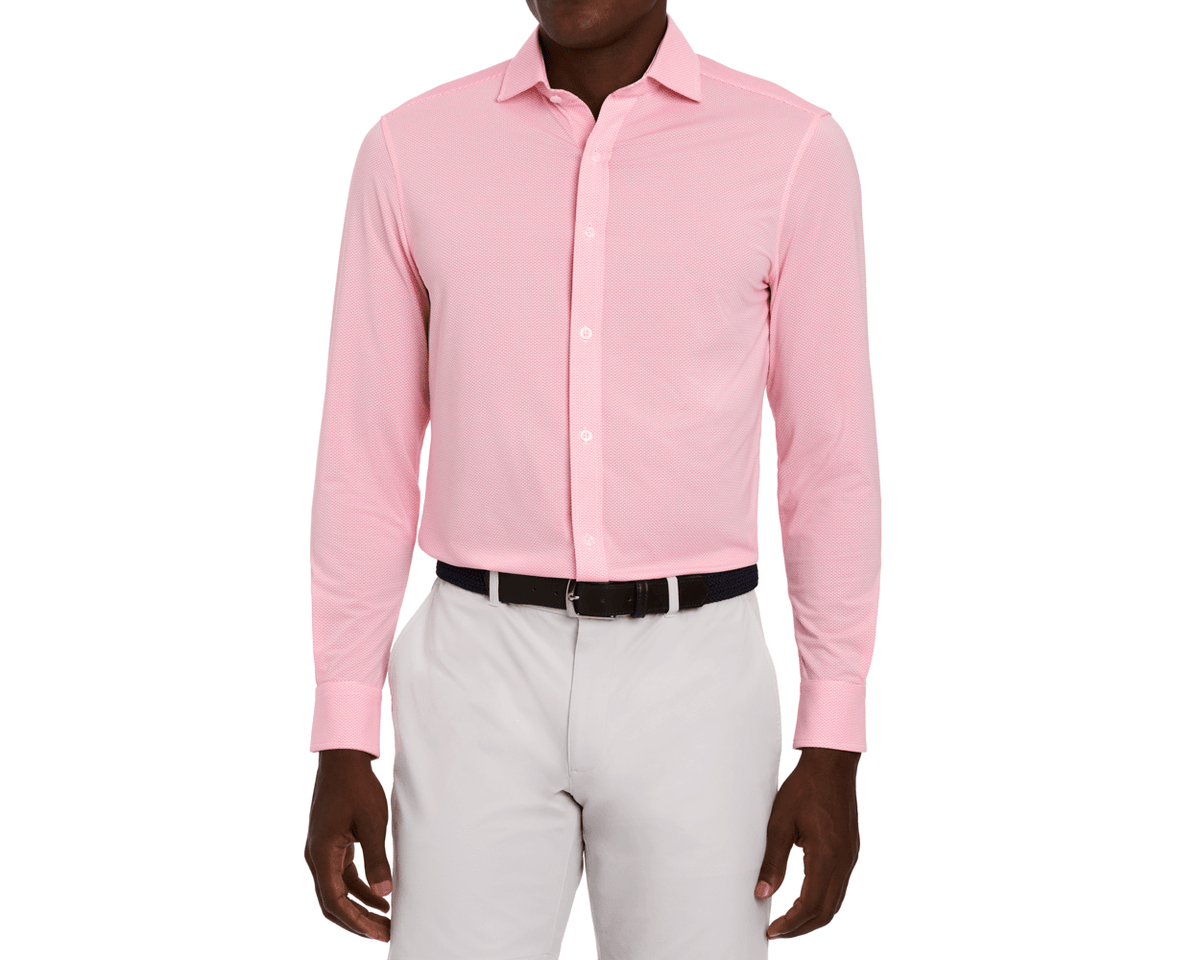 The Goodrich Shirt: Belmont, light-pink, long-sleeve, button-down, showcasing breathable performance pique with geometric print, tucked into trousers, perfect for versatile occasions.