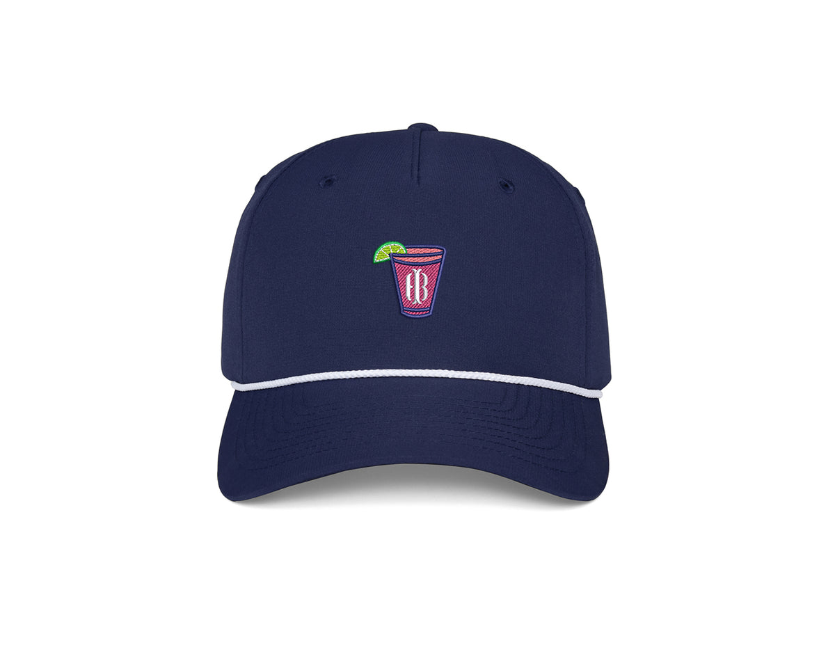 The Performance Rope Hat: Navy with Transfusion Icon features a pink slushy graphic, white rope trim, moisture-wicking fabric, UPF 50+ protection, and adjustable snap-back.