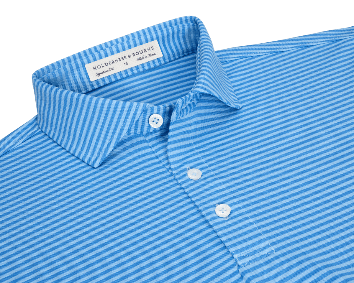 Close-up of The Maxwell Shirt: Horizon Blue & Vista Blue. Features thin white stripes, a structured collar, three-button placket, and Holderness & Bourne label.