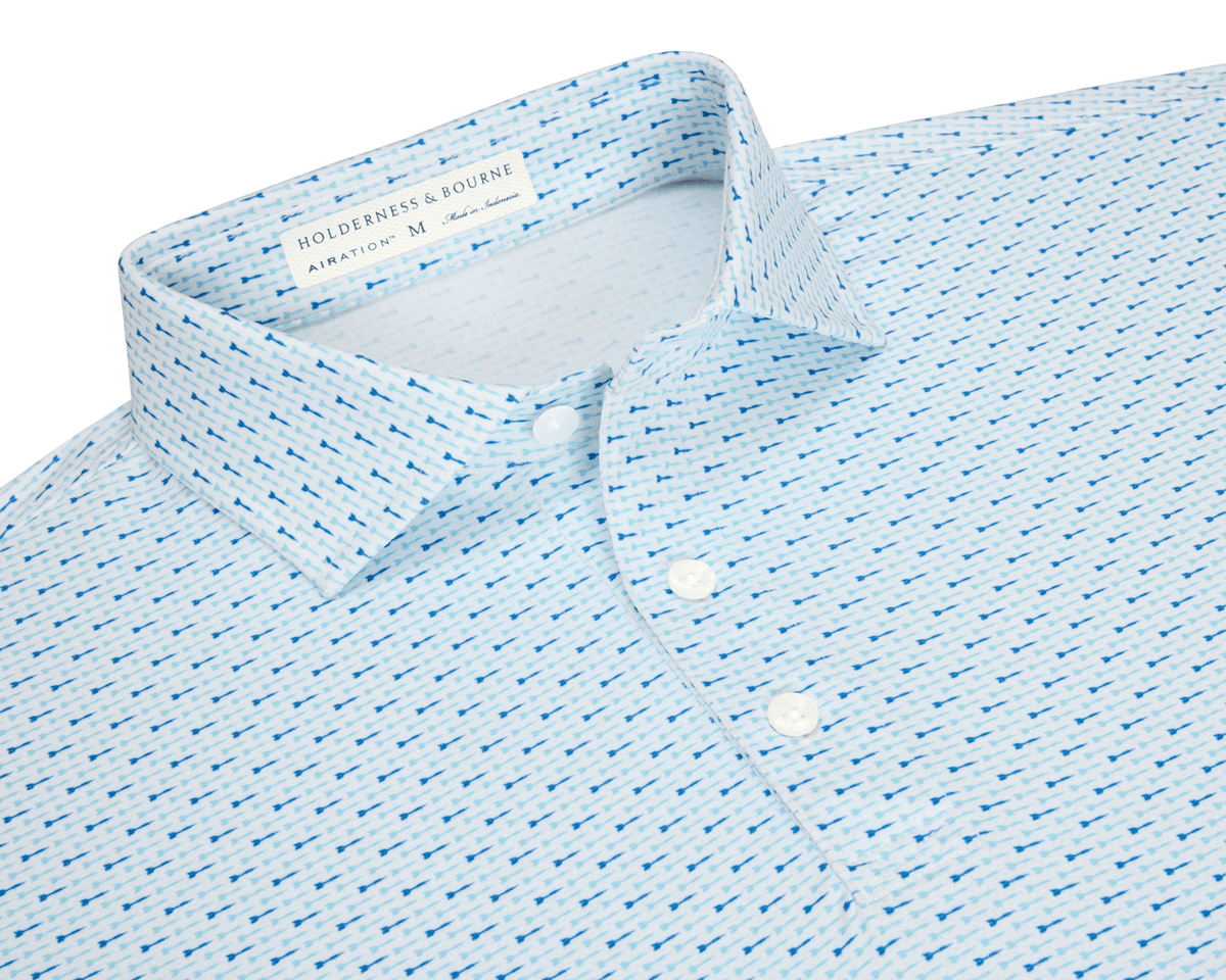 The Cadogan Shirt: Harbor & Maidstone Blue, featuring light-blue fabric with dart motifs, structured collar, three-button placket, and micro perforations for breathability.