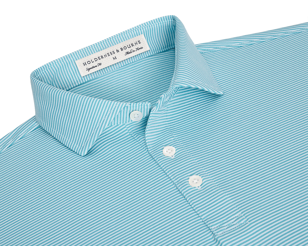 The Perkins Shirt: Harbor & White, an aqua-green polo with thin white stripes, features a point collar, three-button placket, and Holderness & Bourne label.