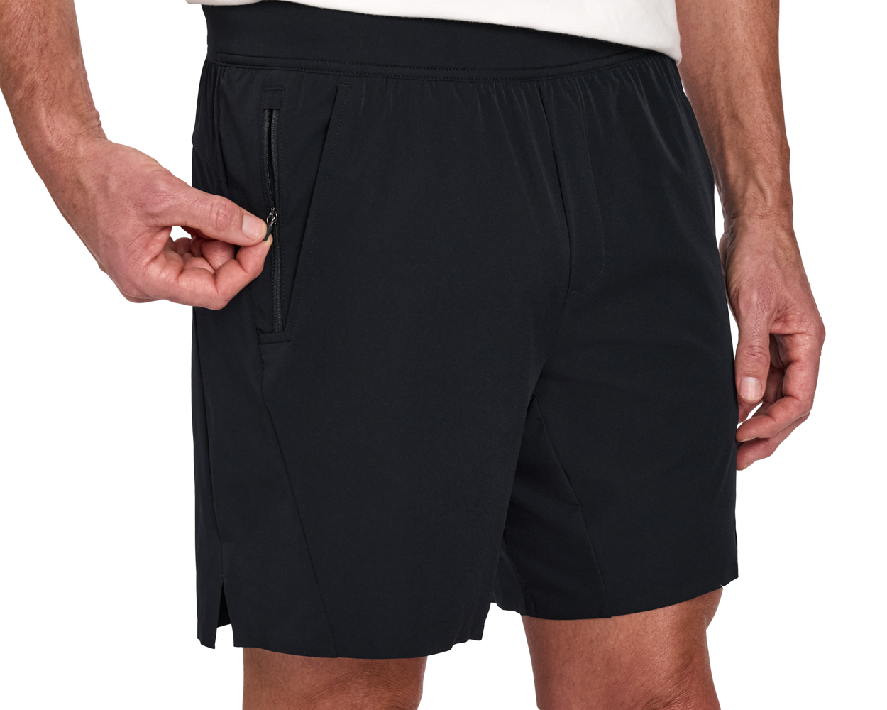 The Saunders Short: Black with elastic waistband, side zippered pocket, small side slits, and visible white shirt edge, ideal for gym workouts.