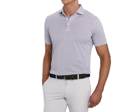 Model wearing The Maxwell Shirt: Heathered Sonoma & White, front view with a navy woven belt and light gray pants, hand tucked into pocket.