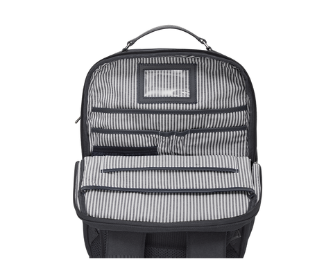 Interior of The Broughton Backpack: Dark Gray showing the striped lining, organizer pockets, clear ID window, and separate lower compartment.