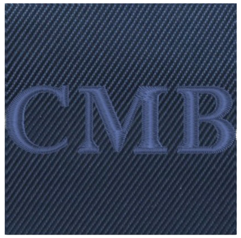 The Treadwell Tote: Navy Ballistic - Navy Embroidery features C M B initials on a dark-blue, twill-style background, showcasing its sleek, durable design.