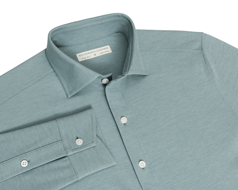 The Cullinane Shirt: Heathered California Spruce flat-lay showing its spread collar, placket buttons, and buttoned cuff.