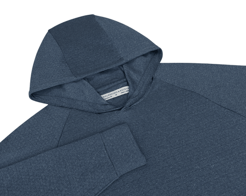 The Ellison Hoodie: Heathered Pacific Blue flat-lay showing its hood, raglan sleeve, banded cuff, and inner Holderness & Bourne neck label.