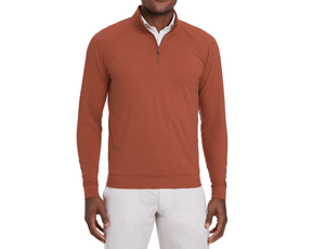 The Westland Quarter-Zip: Heathered Russet, shown over a white shirt with light trousers, showcases its soft, moisture-wicking peached fabric and gunmetal chrome trim.