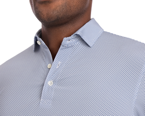 The Armfield Shirt: Andover features a subtle geometric pattern, three-button placket, and classic collar, offering UPF 50+ protection and moisture-wicking performance.