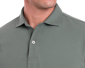 The Neville Shirt: Ivy features a soft collar, single button, and a relaxed fit, visible in the close-up of the torso and jawline.