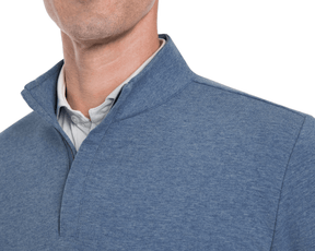 Man wearing The Harper Quarter-Zip: Heathered Bedford, showcasing a plush terry interior and ribbed cuffs for comfort and style, ideal for versatile, year-round wear.