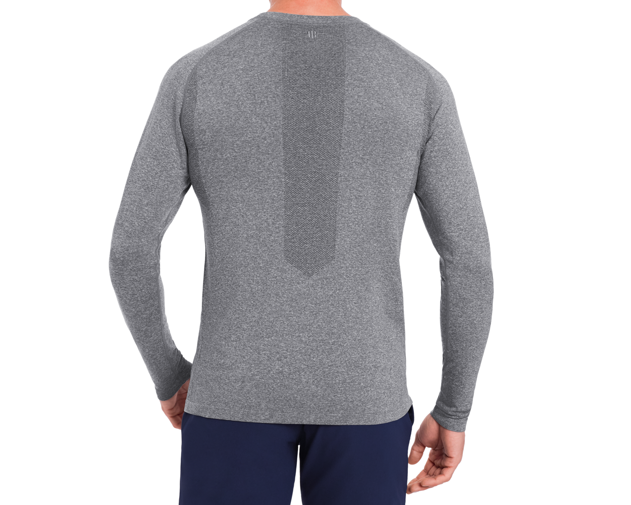 Back view of The Carr T-Shirt: Heathered Gray, showcasing ventilated back panel, worn with dark navy bottoms, highlighting its sleek fit and breathable fabric.