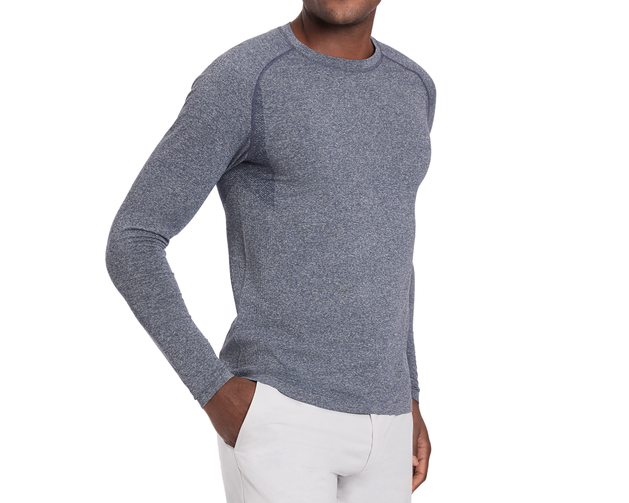 Person wearing The Carr T-Shirt: Heathered Navy, a fitted, long-sleeve shirt with advanced moisture-wicking and four-way stretch, hand casually in pocket.