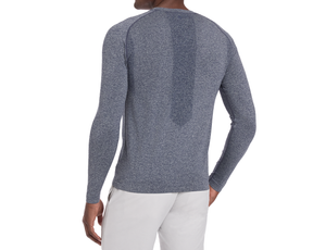 The Carr T-Shirt: Heathered Navy, shown from the back, features a textured vertical back panel, designed for breathability and comfort with seamless, moisture-wicking fabric.