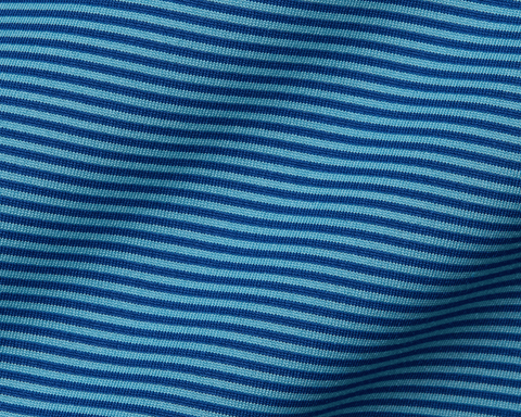 The Perkins Boys Shirt: Maidstone Blue & Harbor features striped knit fabric with light and dark blue bands, showcasing a structured spread collar and unique geometric pattern.