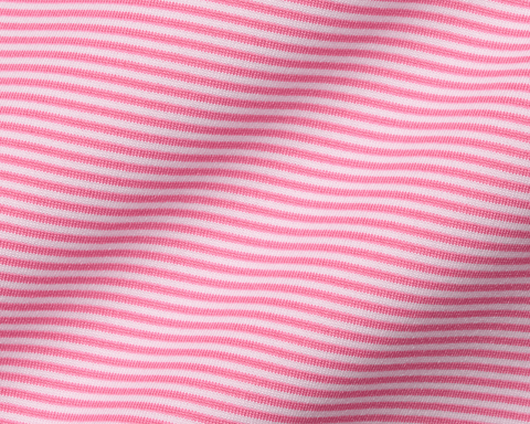 The Perkins Shirt: Belmont & White, featuring fine knit pink and white stripes, showcases a soft, wavy drape with a structured spread collar.