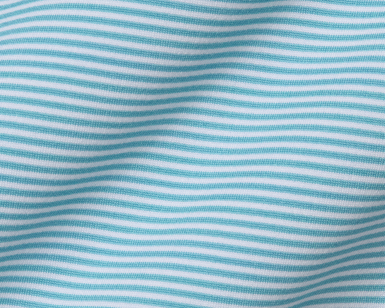 Close-up of The Perkins Shirt: Harbor & White, showcasing its soft knit fabric with thin horizontal stripes, designed for comfort and performance with a structured spread collar.