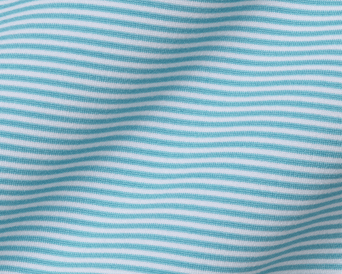Close-up of The Perkins Shirt: Harbor & White, showcasing its soft knit fabric with thin horizontal stripes, designed for comfort and performance with a structured spread collar.