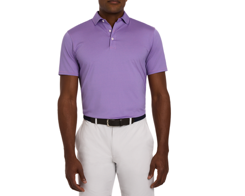 The Perkins Shirt: Horizon Blue & Belmont features a slim-fit, short-sleeve polo with a purple-blue micro-stripe pattern, tucked into gray trousers.
