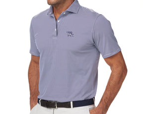 Man wearing Yale Golf Course Perkins Shirt: Navy & White, featuring slim-fit, fine stripes, three-button placket, and embroidered elephant logo, paired with light trousers.