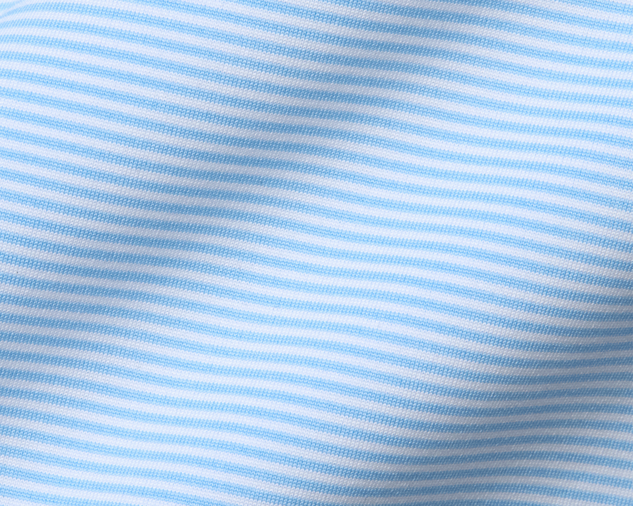 The Perkins Shirt: Vista Blue & White features fine horizontal stripes on a soft, lightweight knit fabric, offering four-way stretch and a structured spread collar.