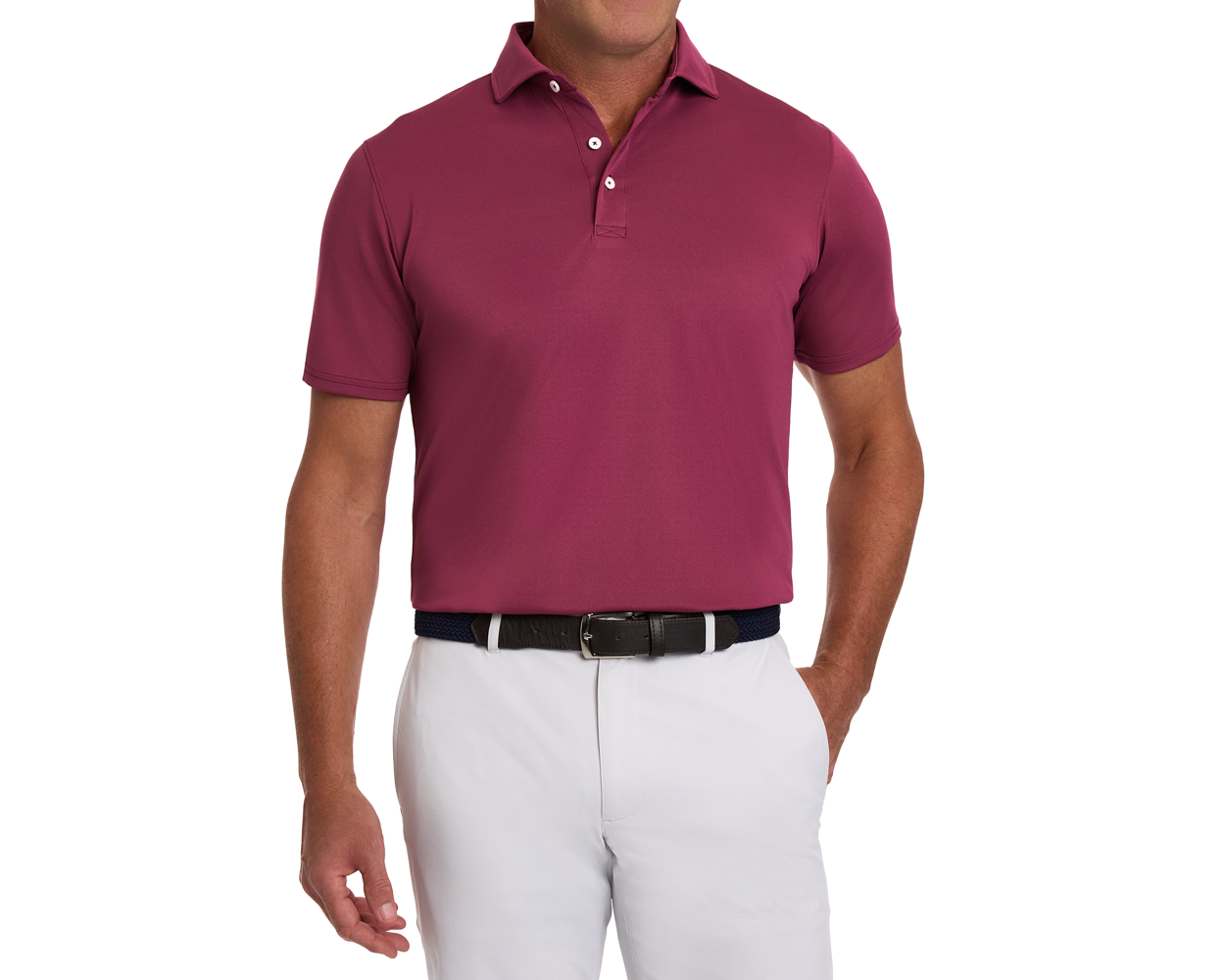 Model wearing The Macdonald Shirt: Cabernet, a short-sleeve polo with contrast collar piping, tucked into light trousers, accessorized with a dark woven belt.