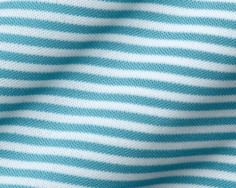 The Maxwell Shirt: Harbor & White features a close-up of its light teal and white striped knit fabric, showcasing texture and gentle folds.