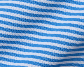 The Maxwell Shirt: Horizon Blue & White features a close-up of its stretchy, textured knit with narrow blue and white stripes for modern style and comfort.