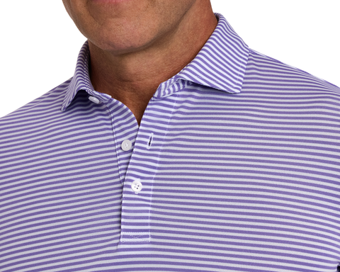 The Maxwell Shirt: Tudor & White, featuring a lavender-striped pattern, structured collar, and white buttons, crafted from breathable, moisture-wicking pique fabric for comfort.