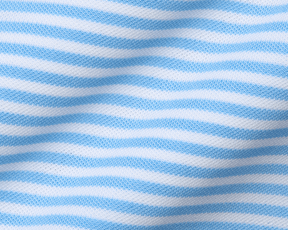 Close-up of The Maxwell Shirt: Vista Blue & White, featuring soft knit fabric with horizontal stripes and textured pique for comfort and moisture wicking.