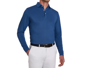 The Abbott Shirt: Andover, shown on a man with a structured spread collar and contrast piping, tucked into trousers, showcasing breathable, modern performance fabric.