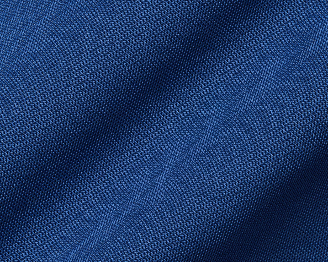 The Abbott Shirt: Andover showcases a textured blue knit, featuring a structured spread collar and contrast collar band piping for a modern, breathable design.