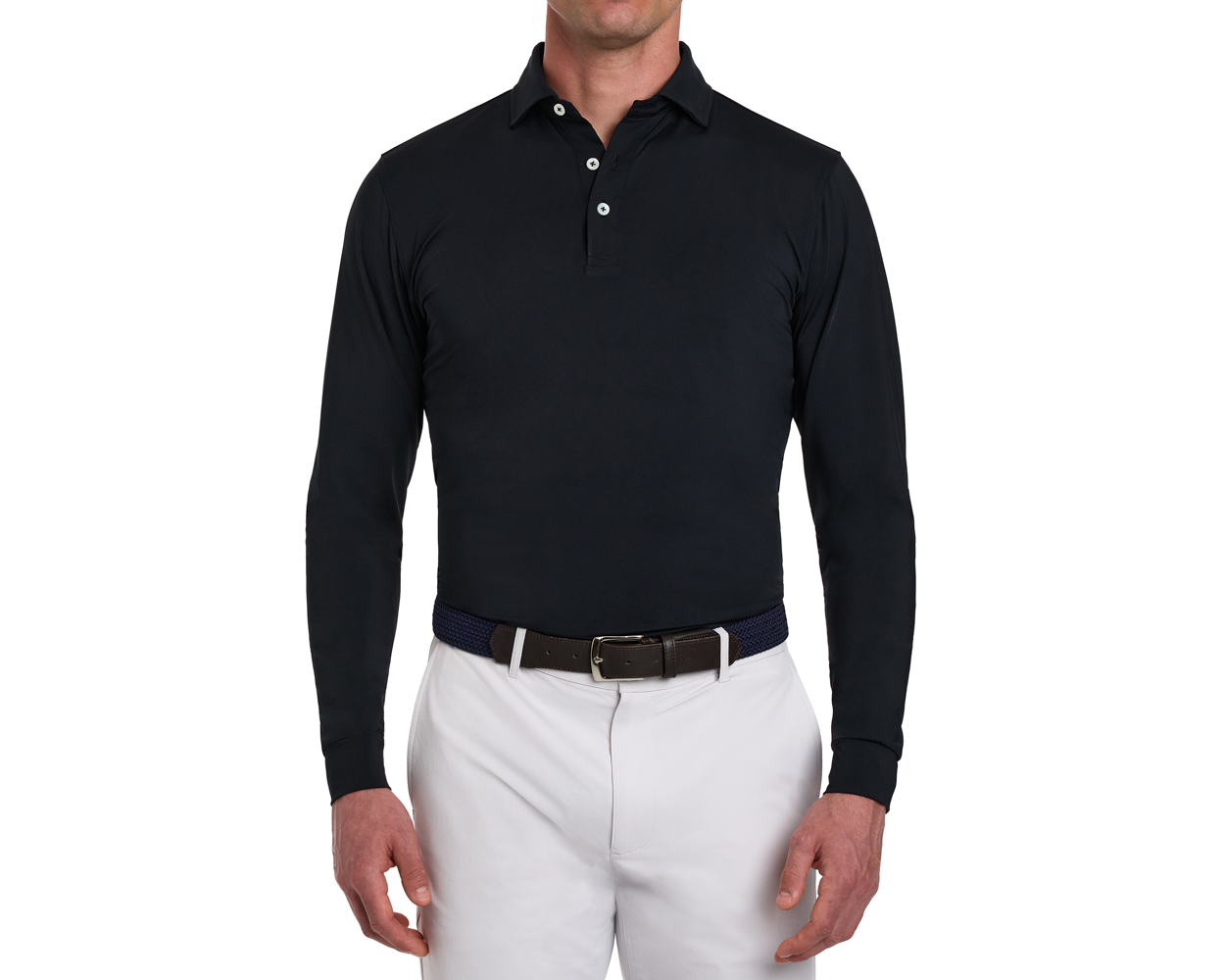 The Farrell Shirt: Black, long-sleeve polo with three-button placket, distinctive spread collar, worn with light trousers and a woven belt with leather accents.