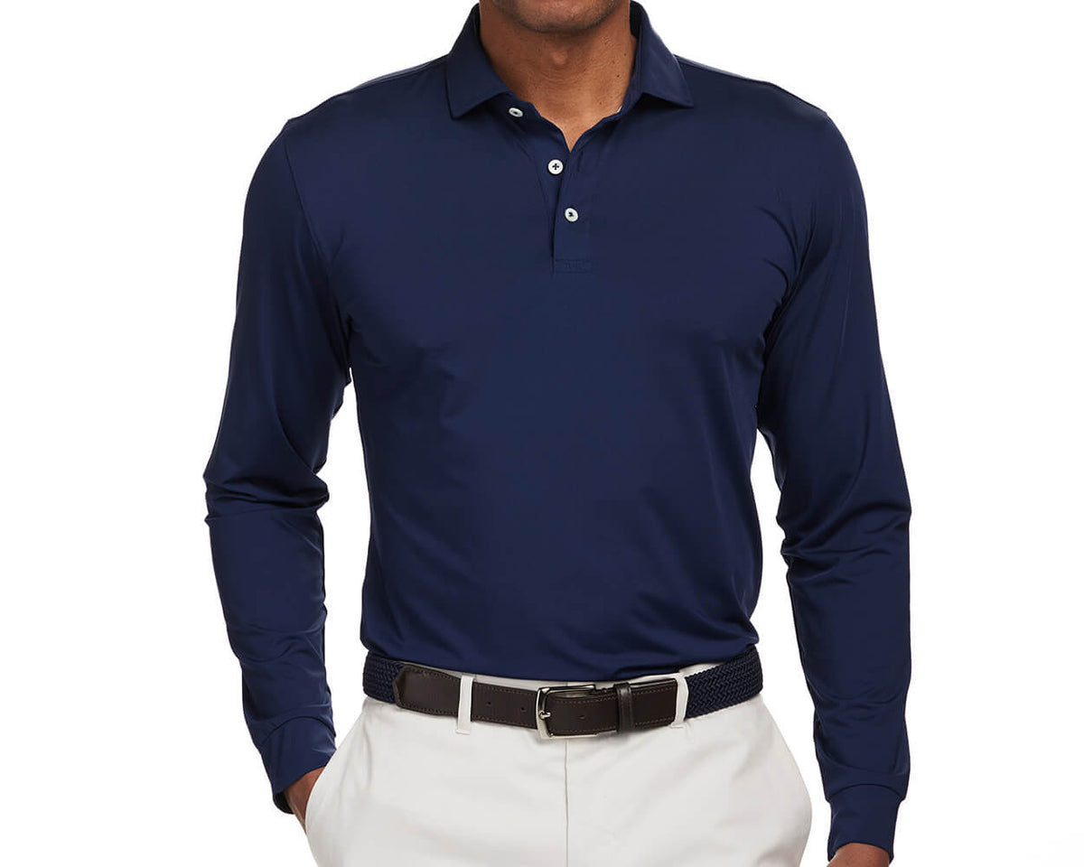 The Farrell Shirt: Navy, featuring long sleeves, a classic polo collar, and a braided belt, offers sun protection, moisture-wicking, and a soft hand feel.