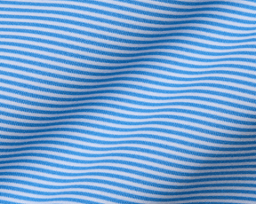 The Burke Shirt: Horizon Blue & White features fine horizontal stripes, showcasing a lightweight, breathable fabric ideal for sun protection and comfort.