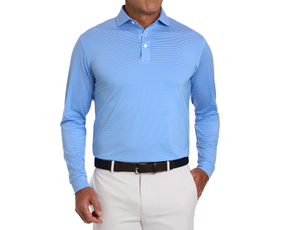 Man wearing The Burke Shirt: Horizon Blue & White, a light-blue long-sleeve polo with fine stripes, tucked into light trousers, showcasing comfort and sun protection.