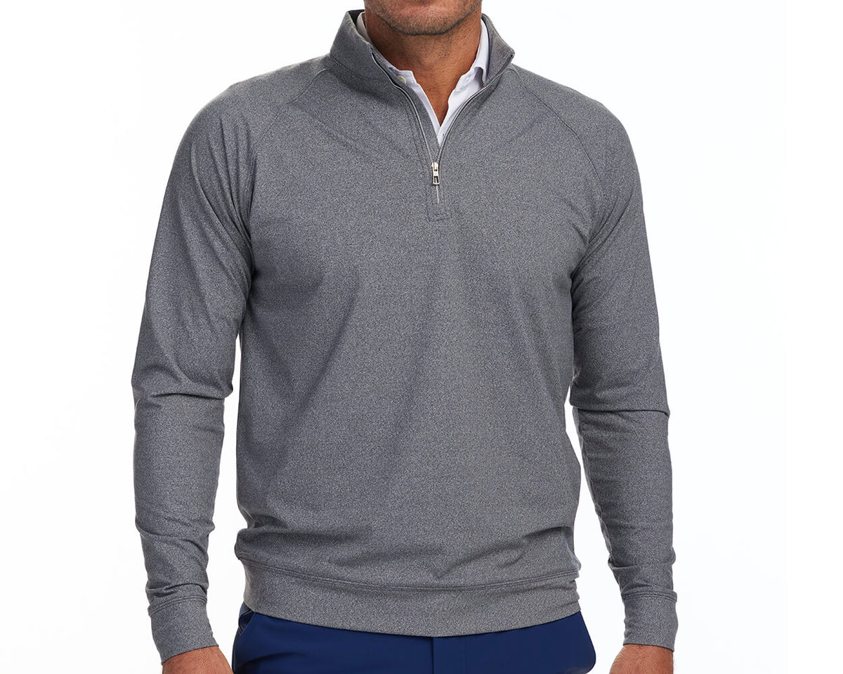 Front shot of Holderness and Bourne charcoal man quarter zip modeled on man's torso.