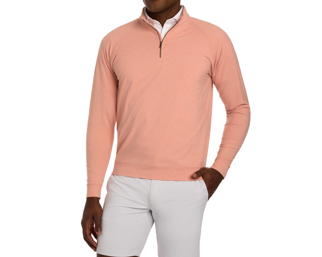 Model in The Westland Quarter-Zip: Heathered Nectarine, layered over a white shirt with light shorts, showcasing the pullover's soft, moisture-wicking fabric and chrome trim.