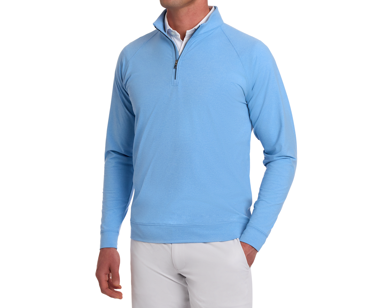 Man wearing The Westland Quarter-Zip: Heathered Vista Blue, with gunmetal chrome trim, over a white shirt and light-colored pants, hand in pocket.