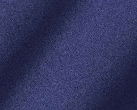 Close-up of The Westland Quarter-Zip: Navy, showcasing its fine, mottled texture and soft, moisture-wicking fabric, ideal for versatile wear.
