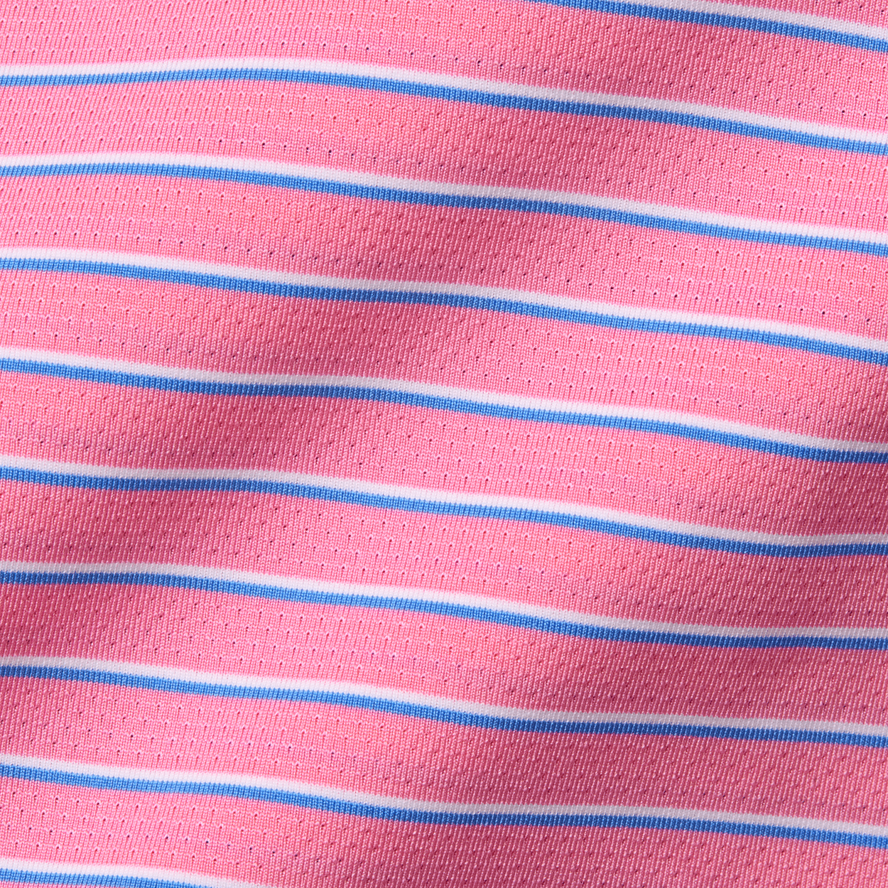 The Springer Shirt featuring breathable pink knit with white and light blue stripes, showcasing AIRATION® fabric for comfort and performance.