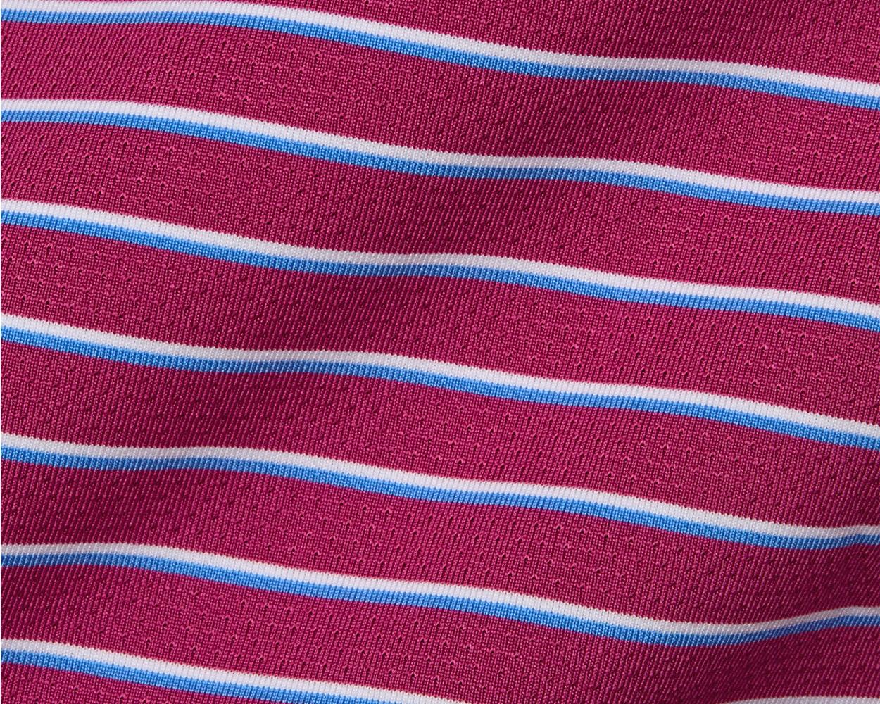The Springer Shirt features a knit textile with horizontal stripes in white and blue, offering performance with AIRATION® fabric, UPF 50+, and four-way stretch.