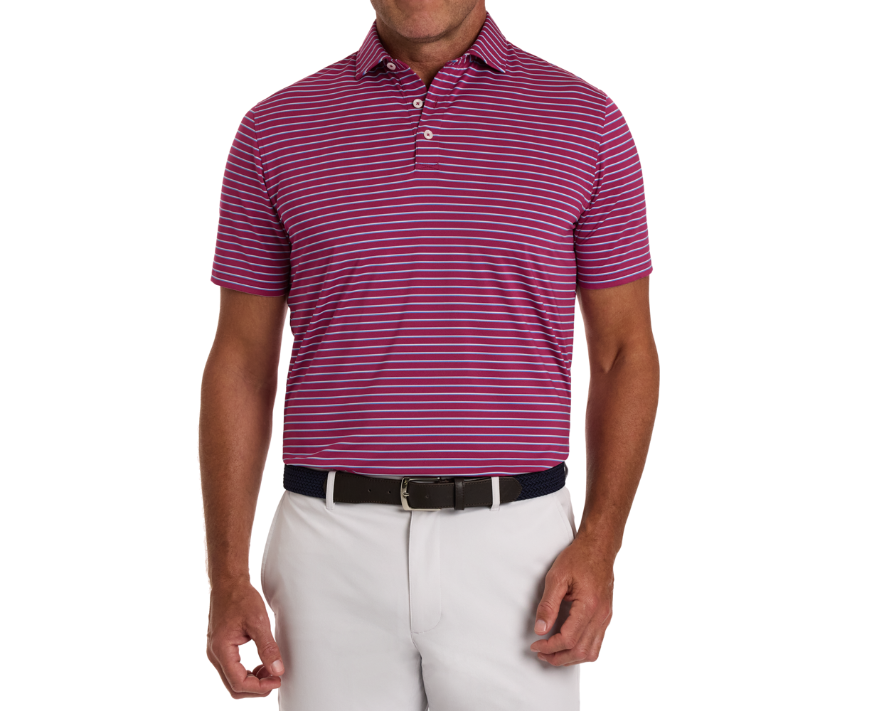 Man wearing The Springer Shirt: Cabernet/White/Horizon Blue, a short-sleeve polo with magenta and white stripes, paired with light trousers and a dark woven belt.