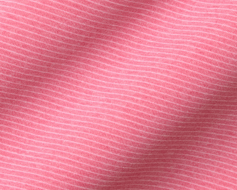 The Holland Shirt: Heathered Belmont, featuring a close-up of its pink knit fabric with fine white stripes, showcasing its lightweight, soft jersey-knit texture and structured collar.