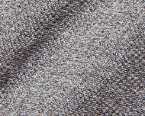 Close-up of The Pickett Performance T-Shirt: Heathered Gray, showcasing its grey, looped knit texture, highlighting the seamless knitting and ultra-breathable AIRATION® fabric.