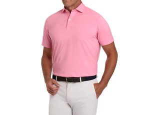The Hatcher Shirt: Belmont & White, light-pink polo shirt with short sleeves, tucked into light trousers, featuring a dark woven belt with a silver buckle.