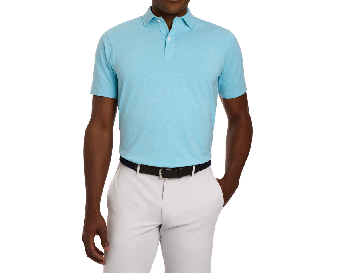 Person wearing The Hatcher Shirt: Harbor & White, a light-blue polo with a black belt, highlighting its structured collar and streamlined fit.