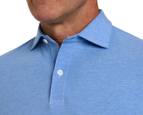 Close-up of The Hatcher Shirt in Horizon Blue & White, showcasing its light-blue fabric texture, structured collar, and two-button placket on a man’s upper torso.