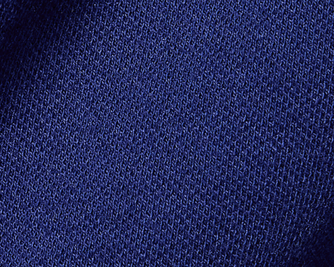 The Neville Shirt: Navy, showcasing a close-up of the fine, textured blue knit fabric, highlighting its soft, durable feel and relaxed collar style.