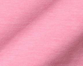 Close-up of The Hatcher Shirt: Belmont & White, showcasing its pink knitted fabric with a fine, uniform texture, highlighting its softness and stretch.